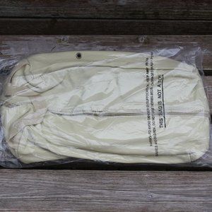 Cream coloured faux leather and black plush shoe bag.  Fits up to men’s size 15.
